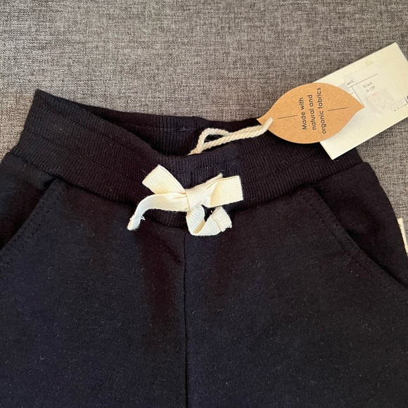 NWT - Greige - baby black bamboo track pants. Size 9-12 months - Picture 2 of 5